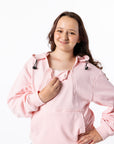 Alex showing Chest Zippers on Zipper Access Hoodie