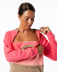 Michelle showing chest zippers