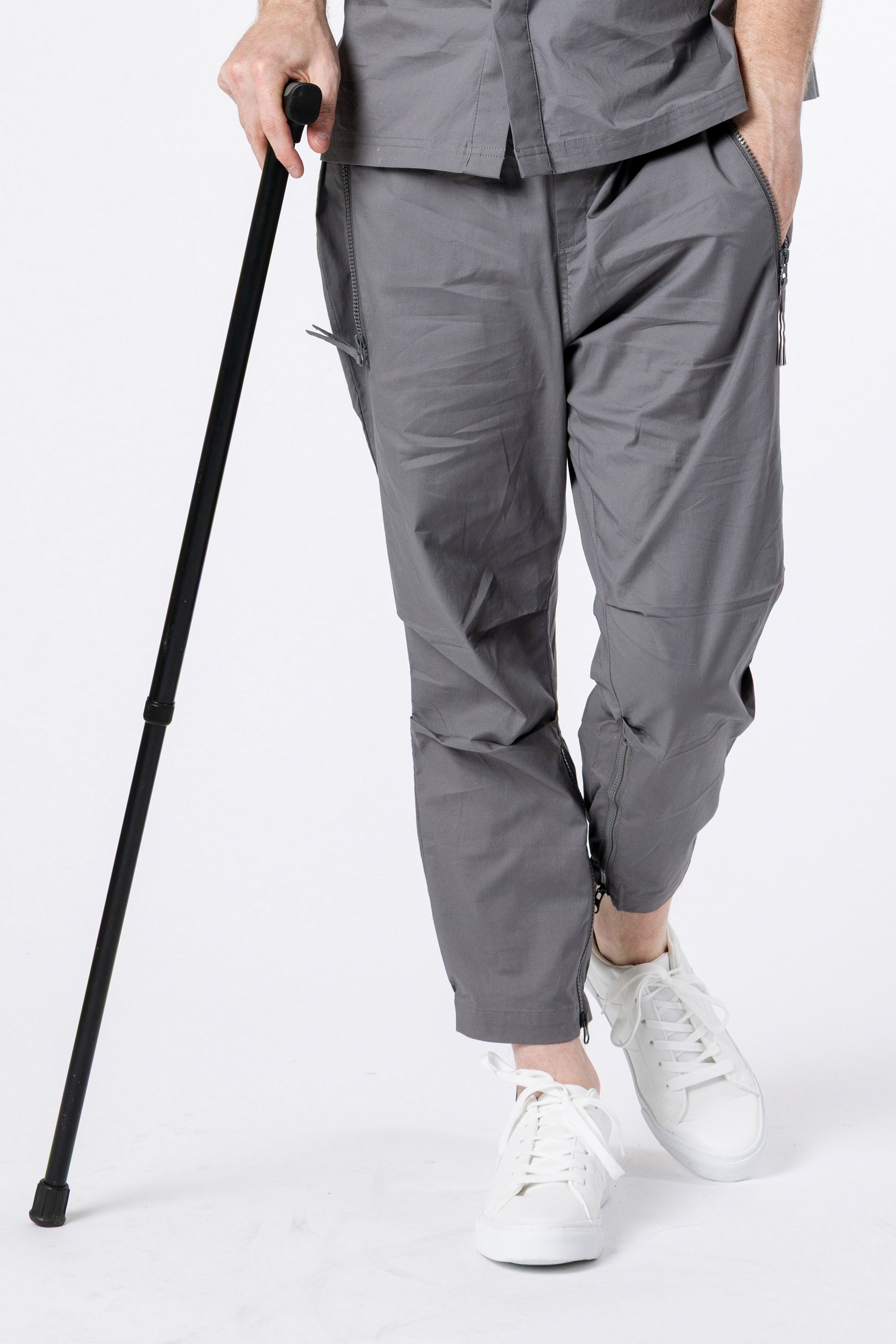 Closeup of man wearing Gray Casual Zip Pants