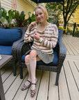 Cienna Ditri in Yarn dye Zip Chest Access Tee, showing chest zippers