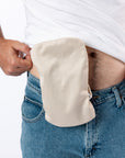 Beige ostomy bag cover on male model