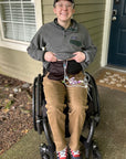 Man in wheelchair wearing Elastic Ostomy Wrap Support Belt