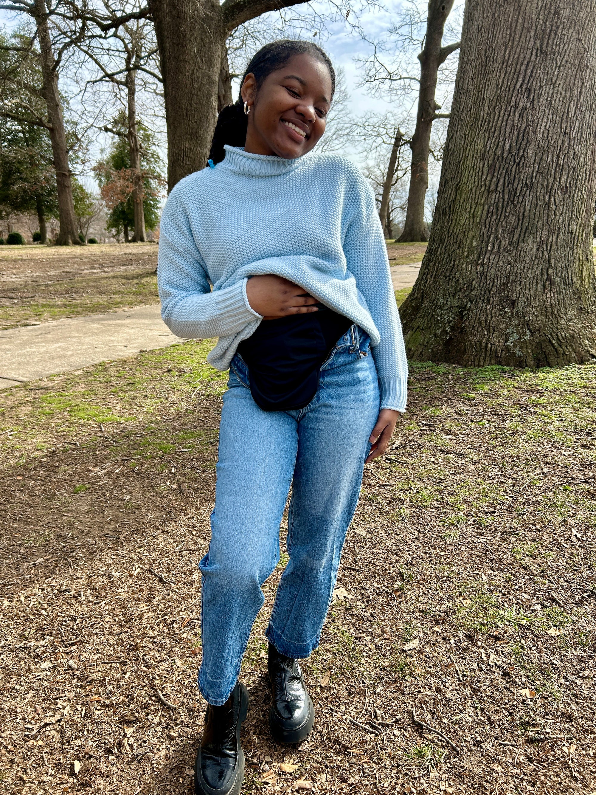 Woman standing outside in elastic ostomy wrap support belt