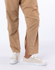 Closeup of unzipped ankle zipper