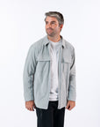 Reed is 5'9 1/2" wearing a size M Stone Zip Shacket