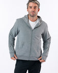 Man wearing gray Full Zip Hoodie with text, "Reed is 5'9" wearing a size M".