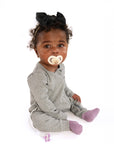 Baby in open Heather Gray Rib G-Tube Pajamas with G-Tube showing
