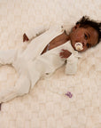 Baby in Vintage White Rib G-Tube Pajamas with G-Tube showing