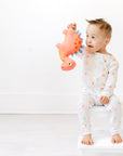 Boy in Dino G-Tube Pajamas
