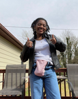 Young woman outside wearing Light Pink Elastic Ostomy Bag Cover