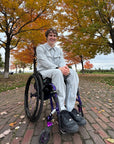 Mason Branstrator wearing Stone Felt Zip Access Shacket and Stone Felt Zip Access Pant in wheelchair