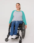 Woman in teal Adult Raglan Chemo Port Access Tee Shirt