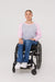 Woman in wheelchair wearing pink Adult Raglan Chemo Port Access Tee Shirt