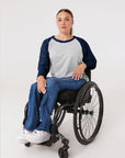 Woman in wheelchair wearing Navy Adult Raglan Chemo Port Access Tee Shirt