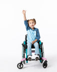 Gracie in wheelchair wearing Raglan Colorblock Raglan Access Tee with arm up
