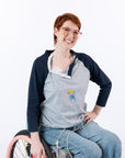 Female model with open chest snaps, showing port