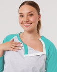 Woman in open Teal Adult Raglan Chemo Port Access Tee Shirt