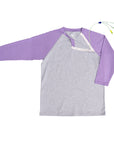 Flat of purple Raglan Access Tee with medical device