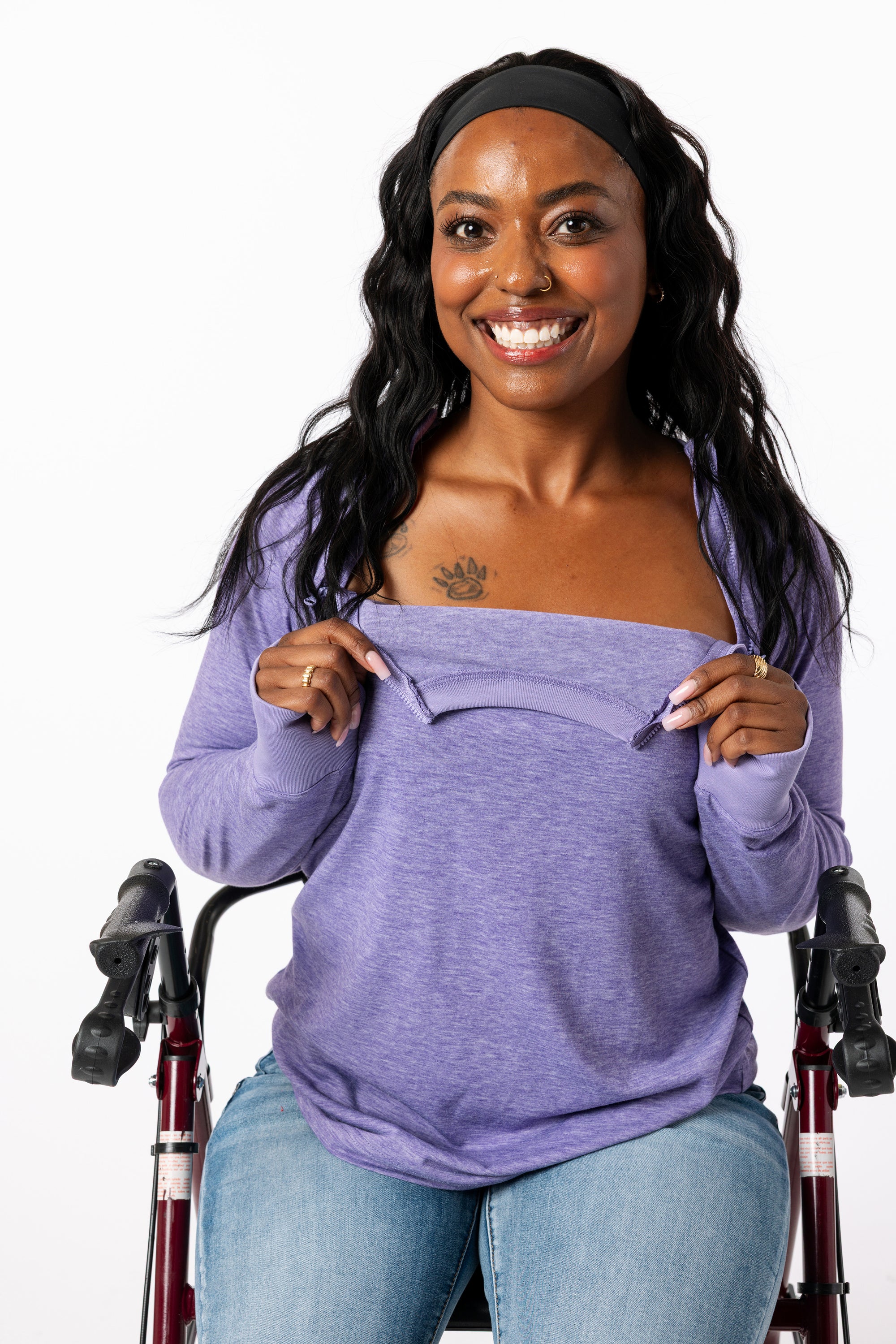 Denisha showcasing open chest zippers