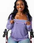 Denisha showcasing open chest zippers