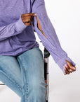 Denisha demonstrating how to open sleeve zipper