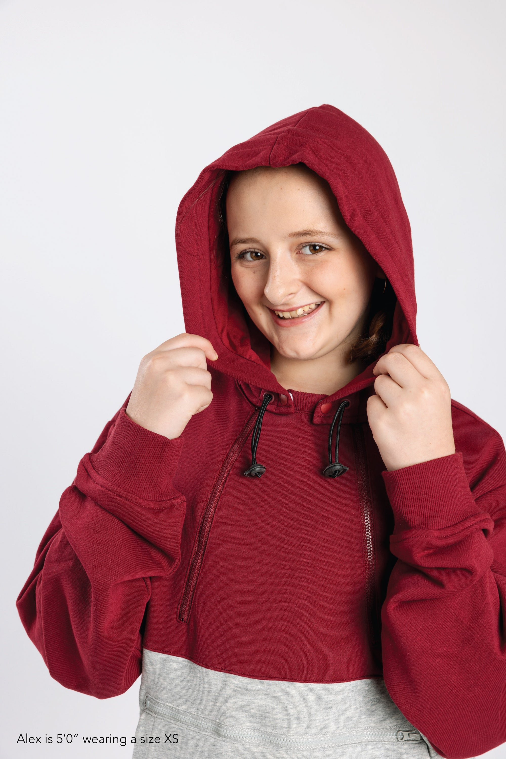 Alex wearing Crimson Colorblock Hoodie, 5'0" wearing size XS