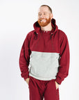 Closeup of Mike wearing Crimson Colorblock Hoodie, 6'2" wearing a size M