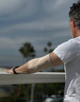 Man wearing beige support sleeve