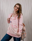 Young woman in Stripe Zip Access Hoodie, showcasing chest port access