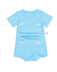 Tummy access bodysuit with flap open and tubing