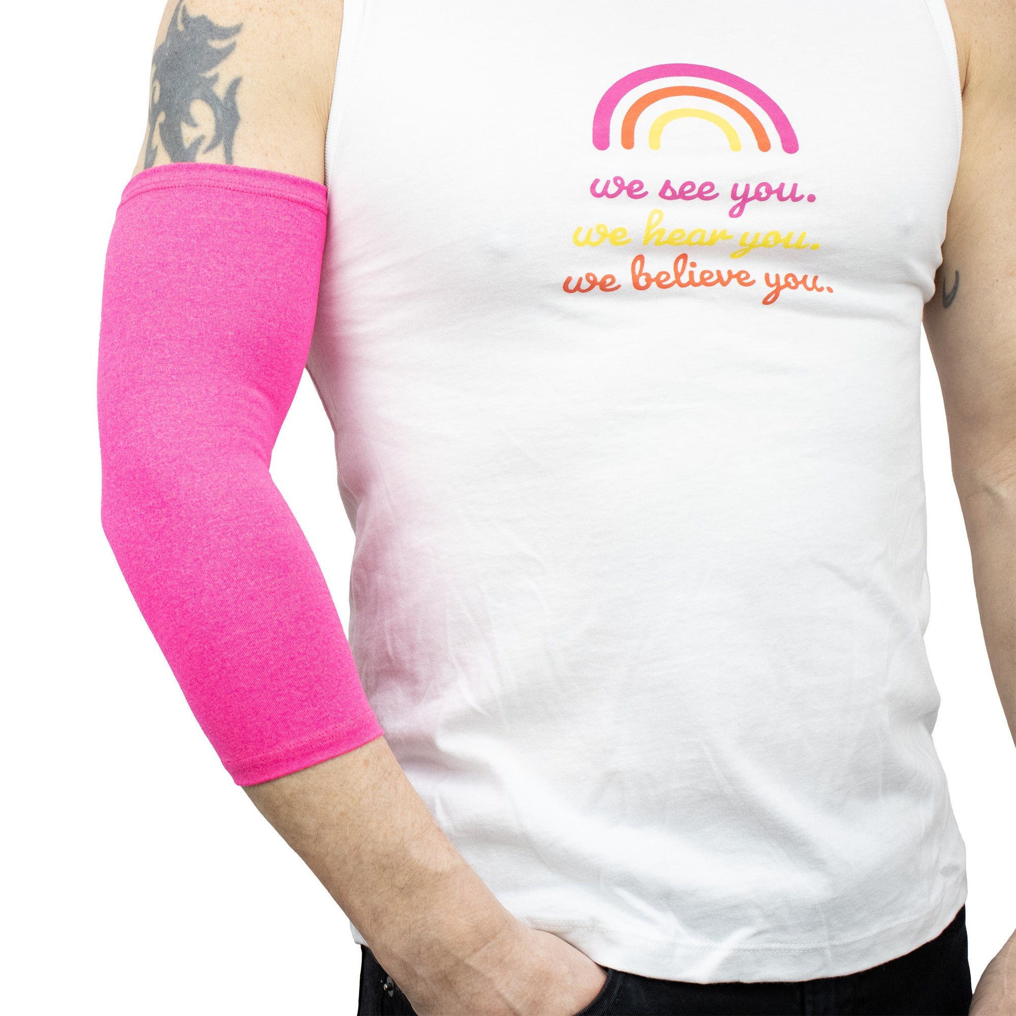 Male model wearing Pink Ultra Support Sleeve on arm