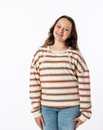 Alex posing in Sunset Longsleeve Yarn-dye Zip Chest Access Tee