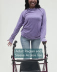 Video showing adaptive features of the Raglan Sleeve Access Tee