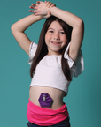 Girl wearing purple g-tube pad and pink stretch waistband