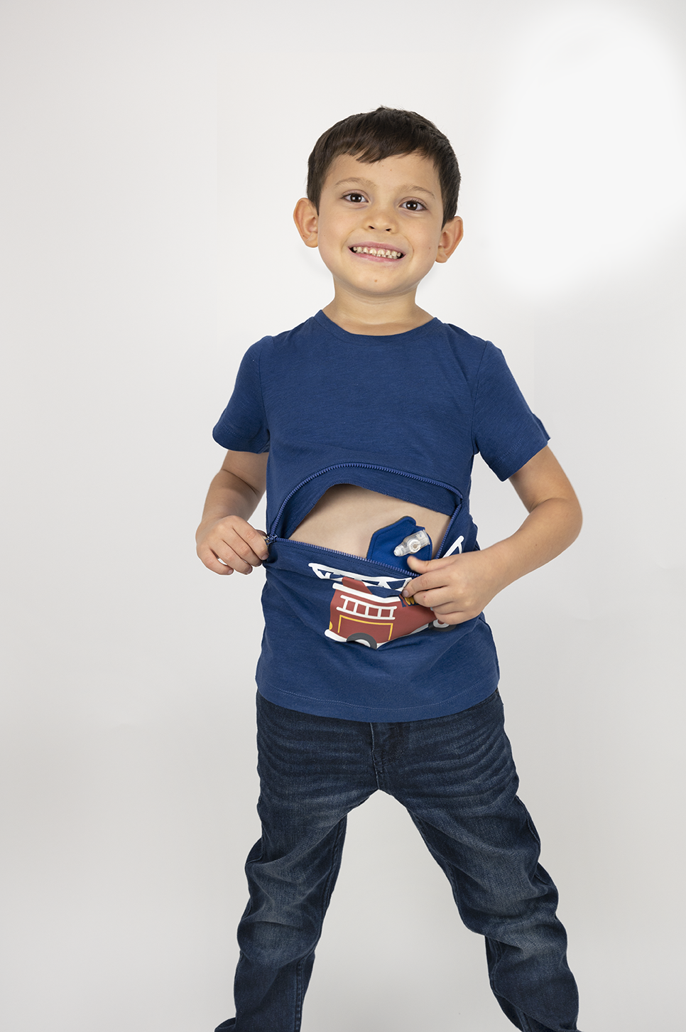 Boy in Firetruck G-Tube Zip Tee with blue G-Tube Pad
