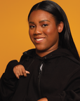 Woman wearing black Adult Chest & Abdomen Zipper Access Hoodie
