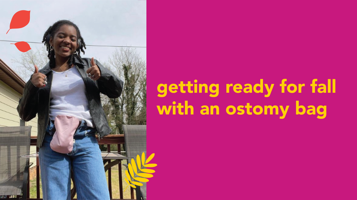 a young black woman is smiling in the outdoors. She has on a white shirt and a jacket and jeans. She is wearing a pink ostomy bag cover. Text reads "Getting ready for fall with an ostomy bag"