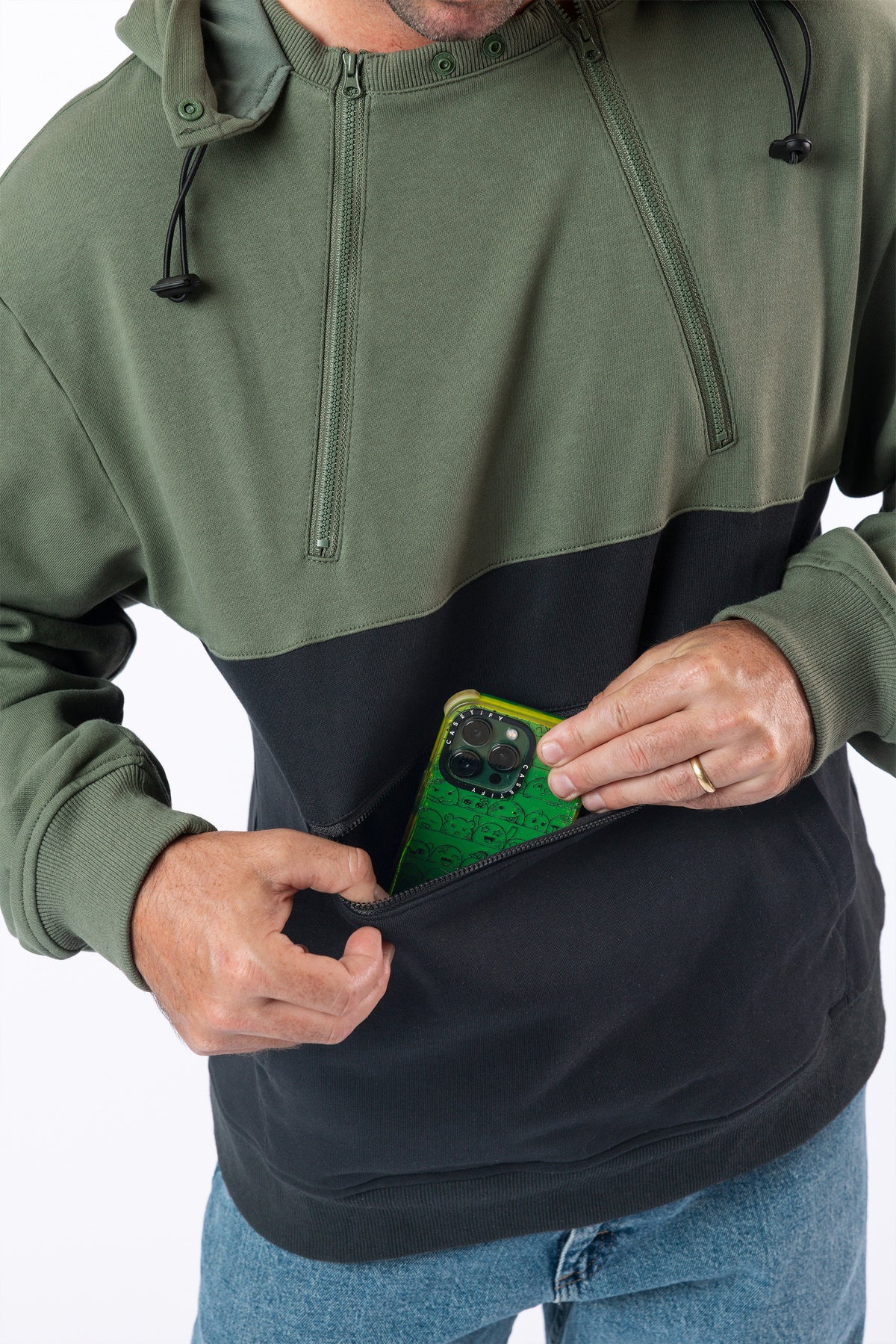 Person placing phone into Spoonie Signature Pocket