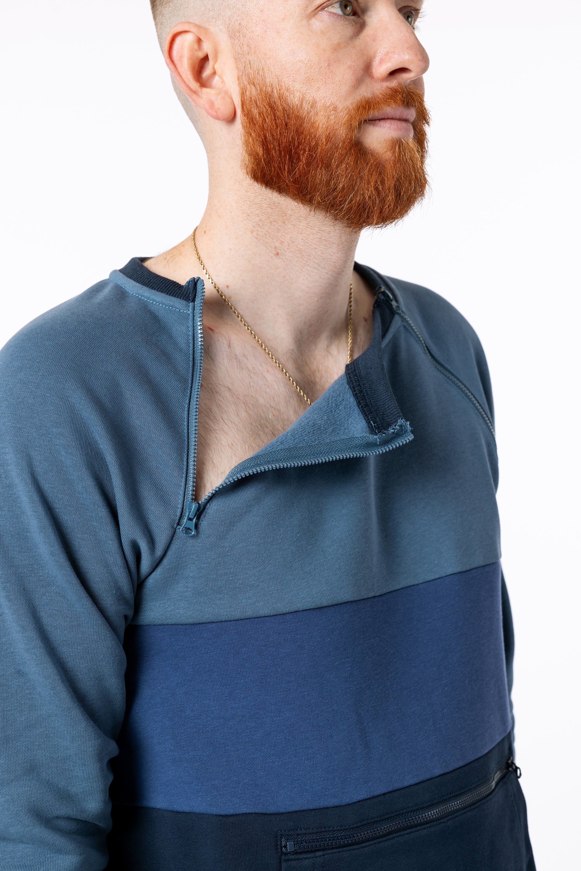 Mike showing open chest zippers
