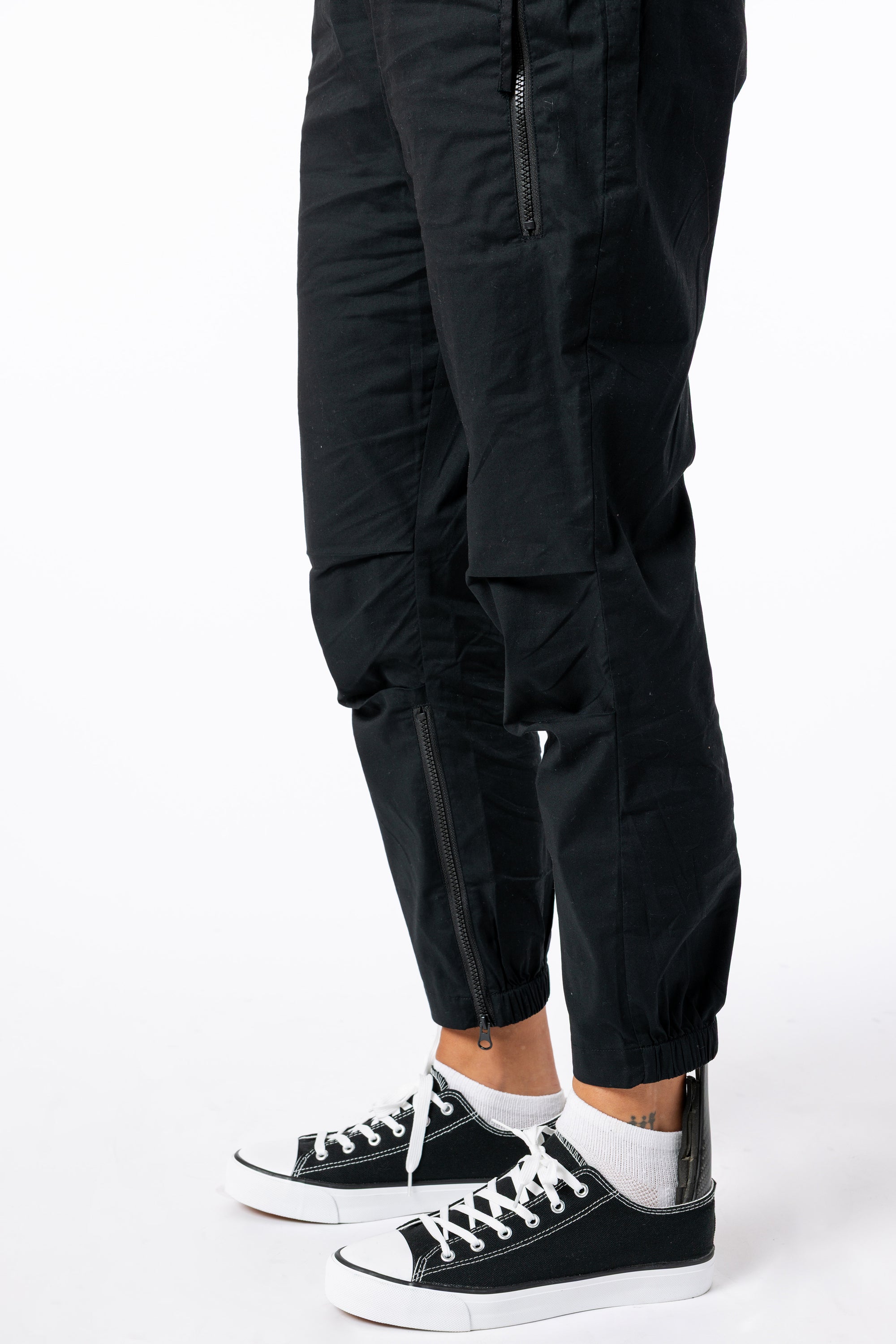Woman wearing Black Casual Zip pants