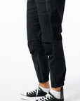 Woman wearing Black Casual Zip pants