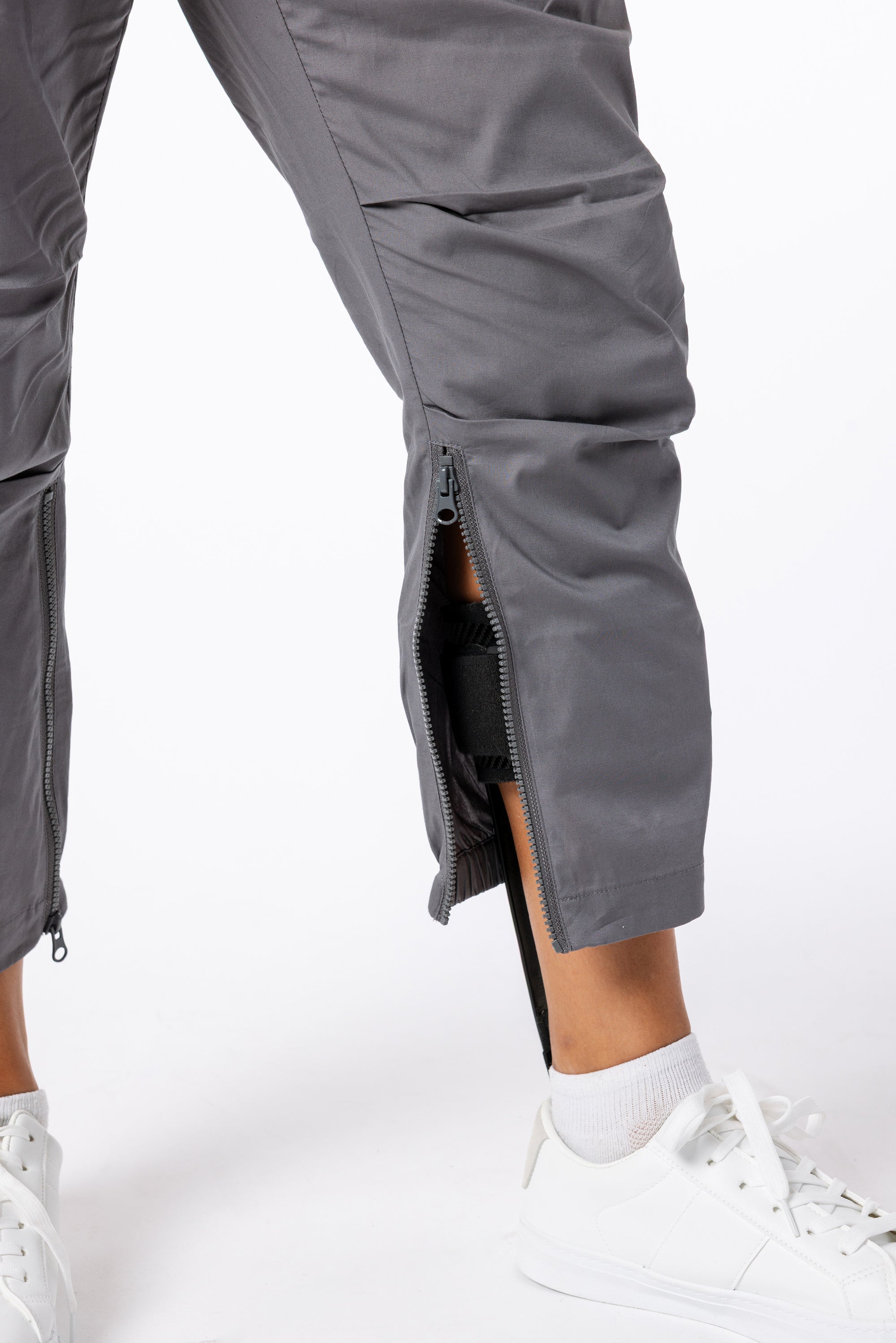 Closeup of open ankle zipper with brace