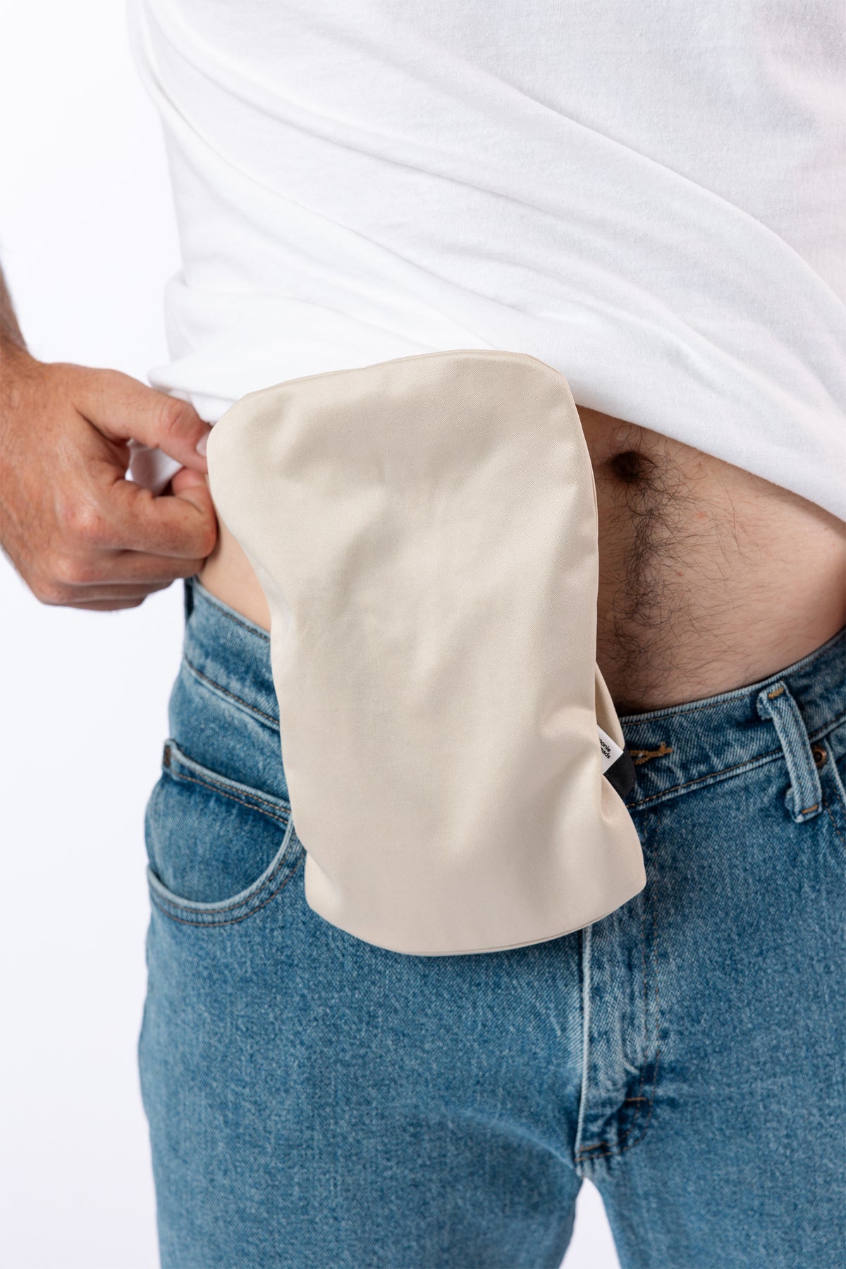Beige ostomy bag cover on male model