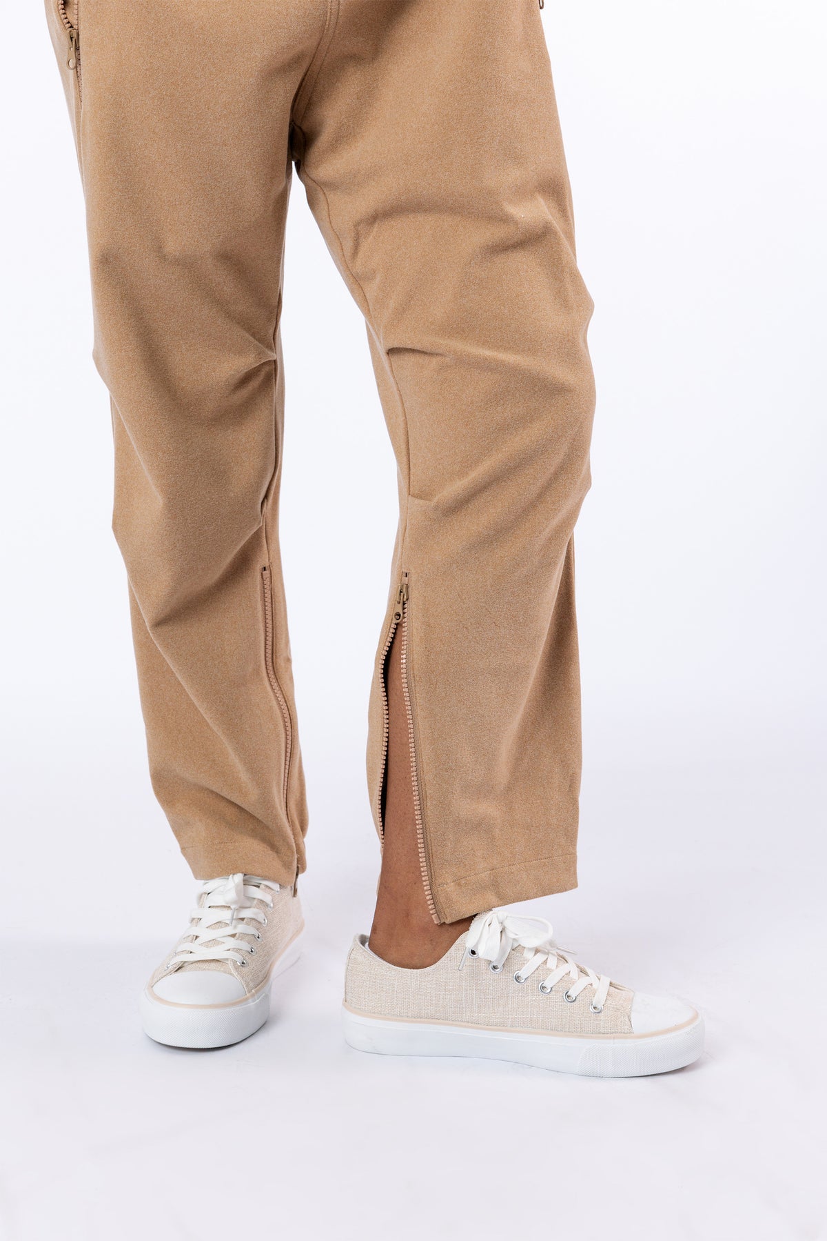 Closeup of unzipped ankle zipper