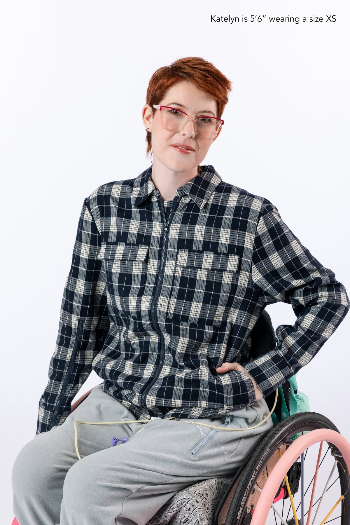 Woman wearing Denim Shacket. Text reads "Katelyn is 5'6" wearing a size XS".