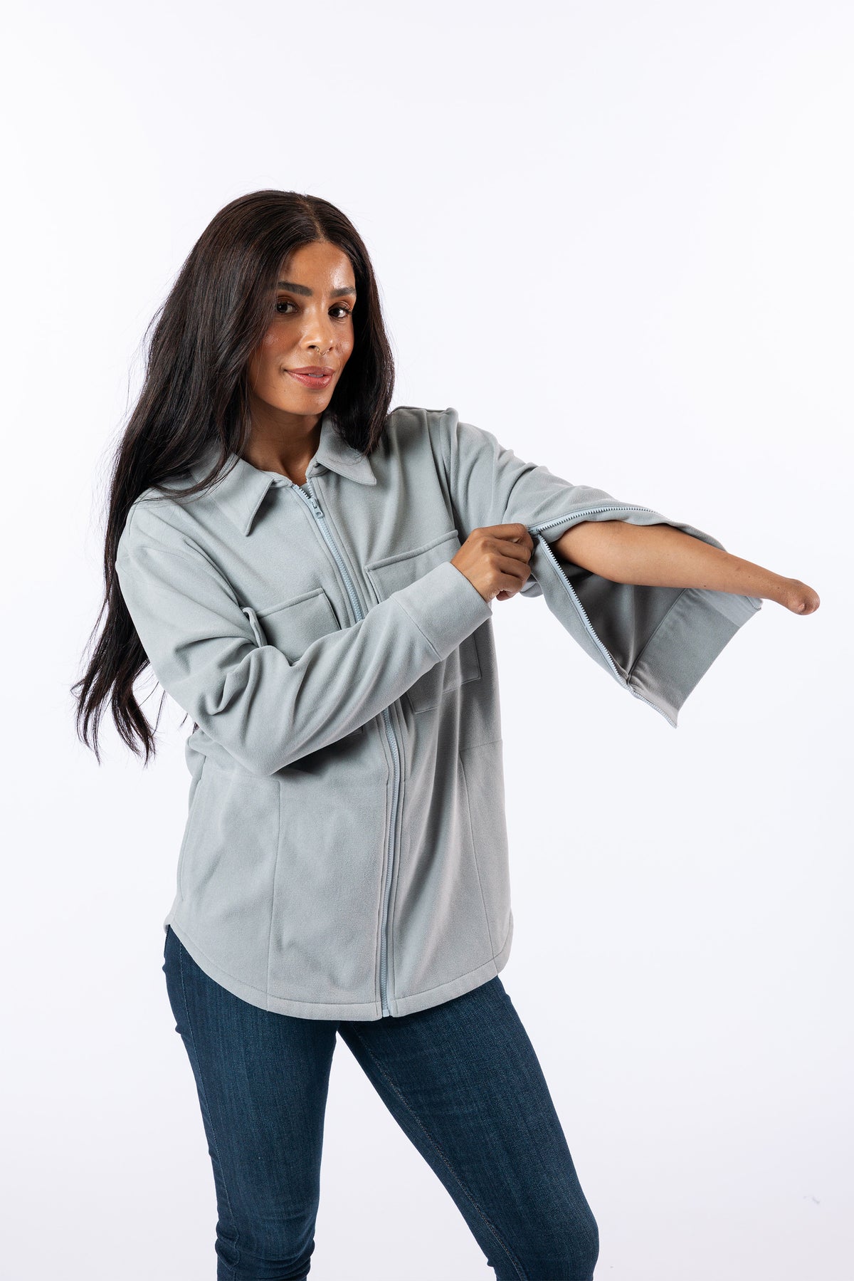 Celia wearing Stone Felt Shacket, showing arm zippers