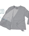 Wrap Blouse showing interior pocket to hold medical devices, such as drainage bulbs