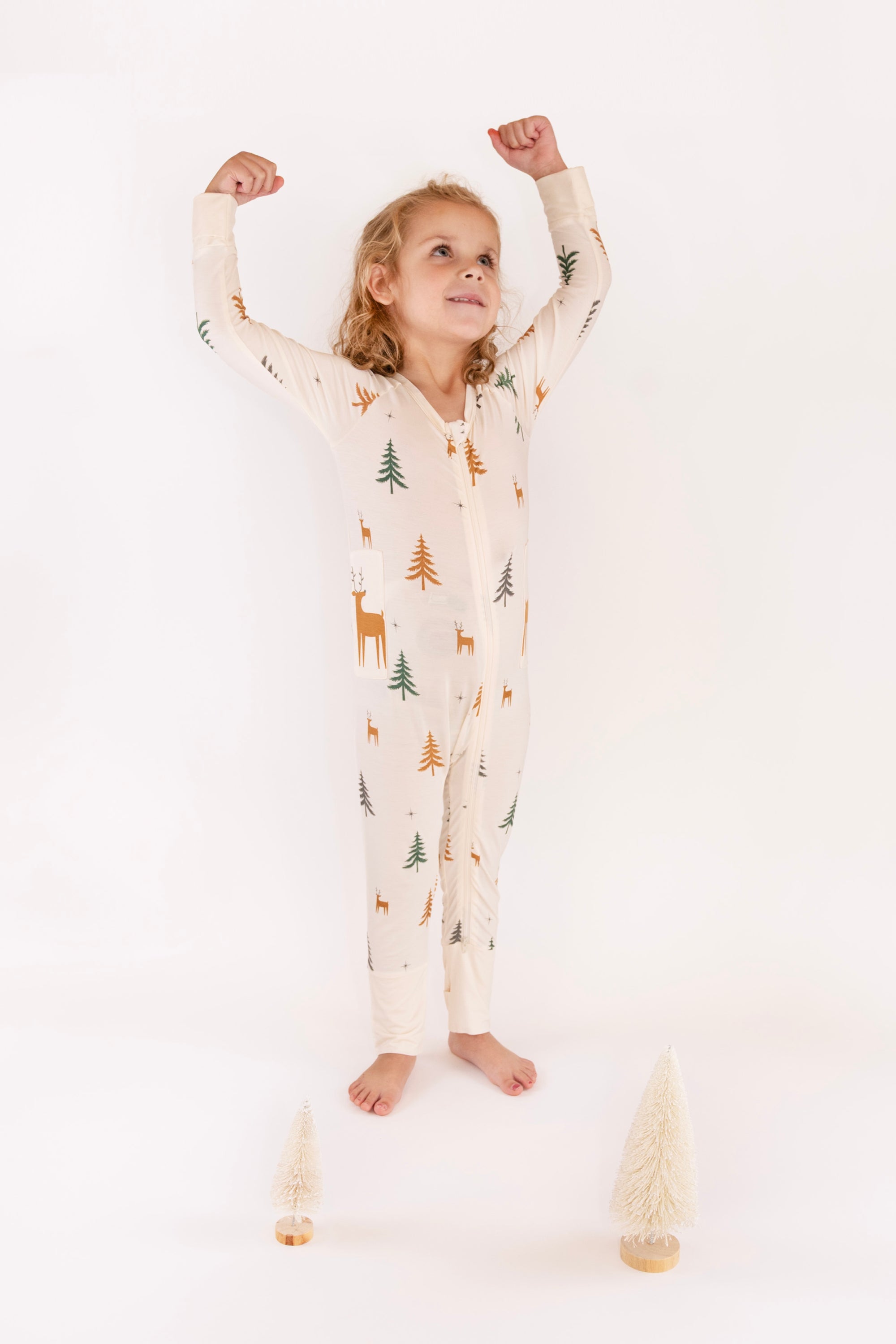 Child posing in Thru the Trees G-Tube Pajamas