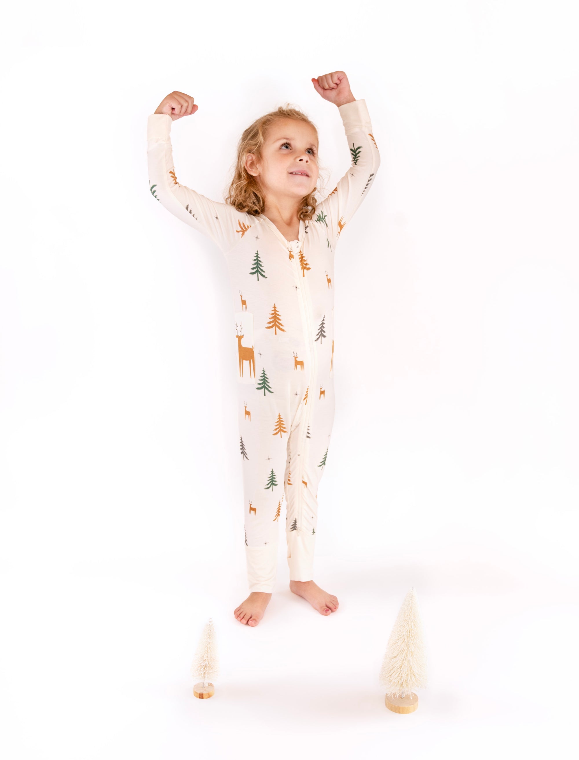 Child posing in Thru the Trees G-Tube Pajamas