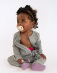 Baby in open Heather Gray Rib G-Tube Pajamas with G-Tube pad showing
